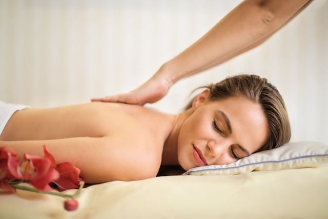 A woman having a back massage