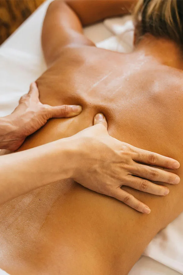 A woman being massaged