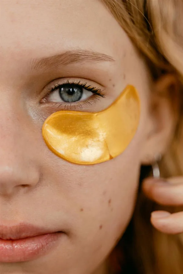 A woman with a patch under her eye
