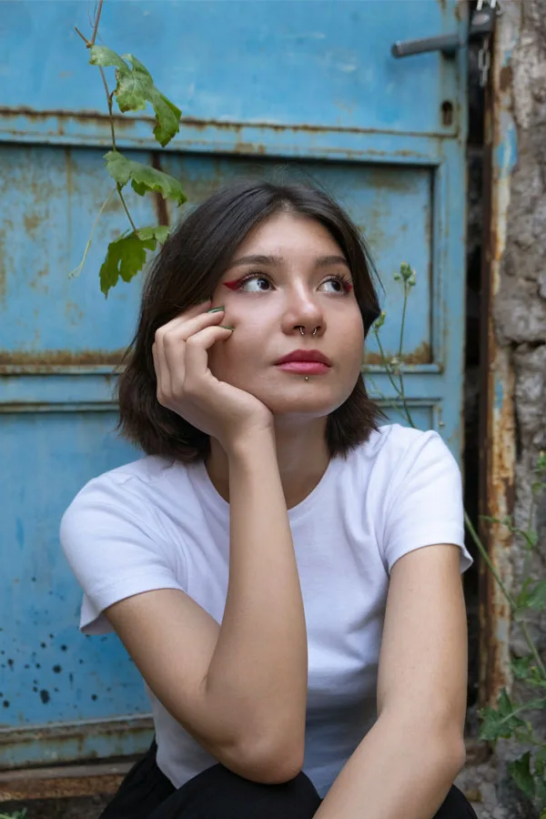 A woman with facial piercings